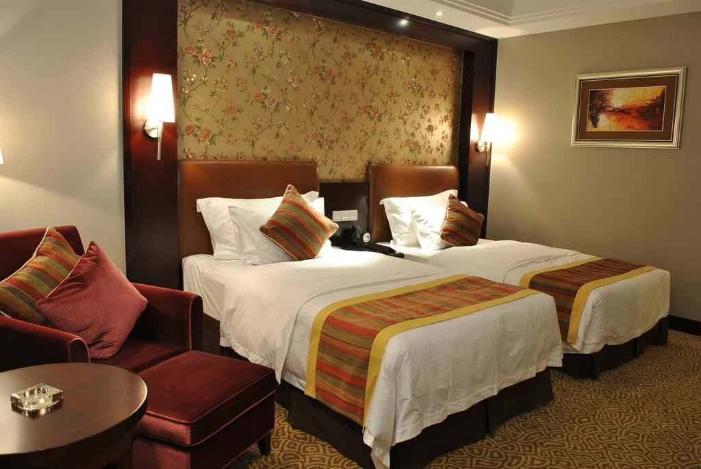 Qingyuan International Hotel Номер фото